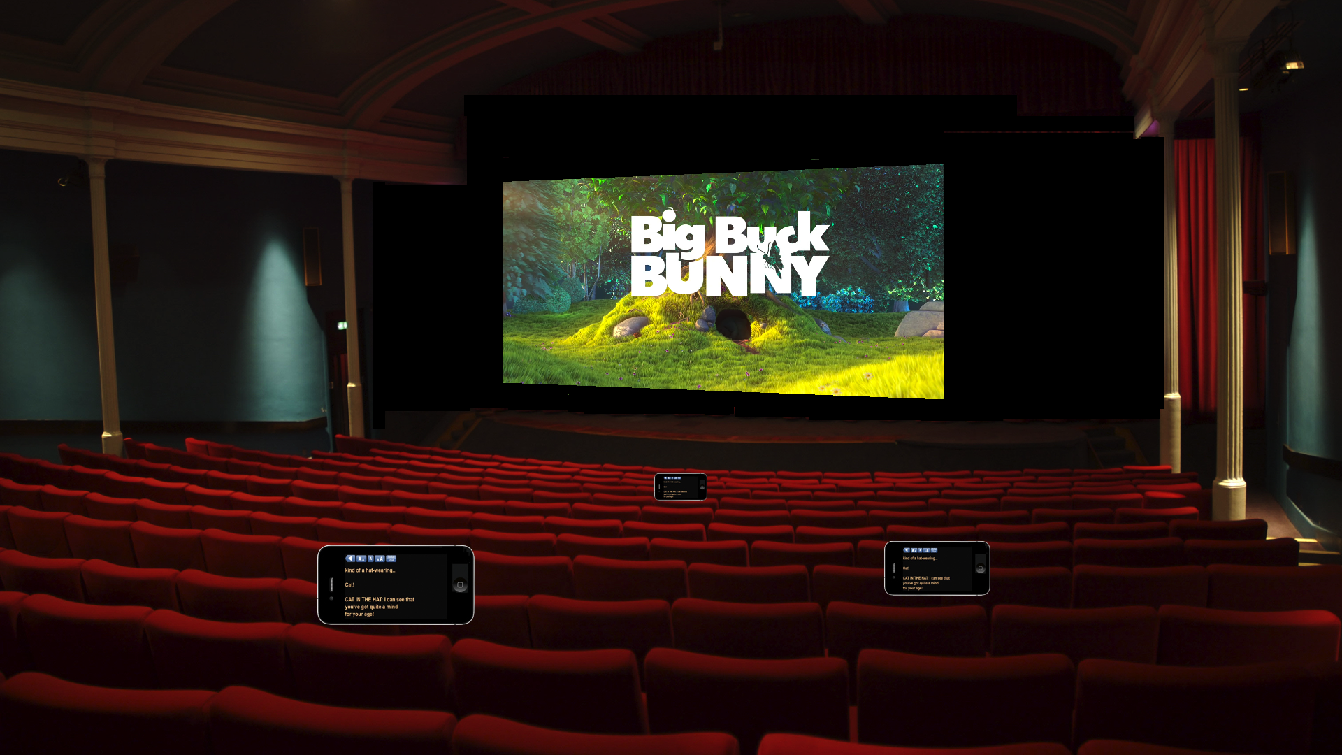 A movie theater interior. There are iphones at a few seats showing captions.